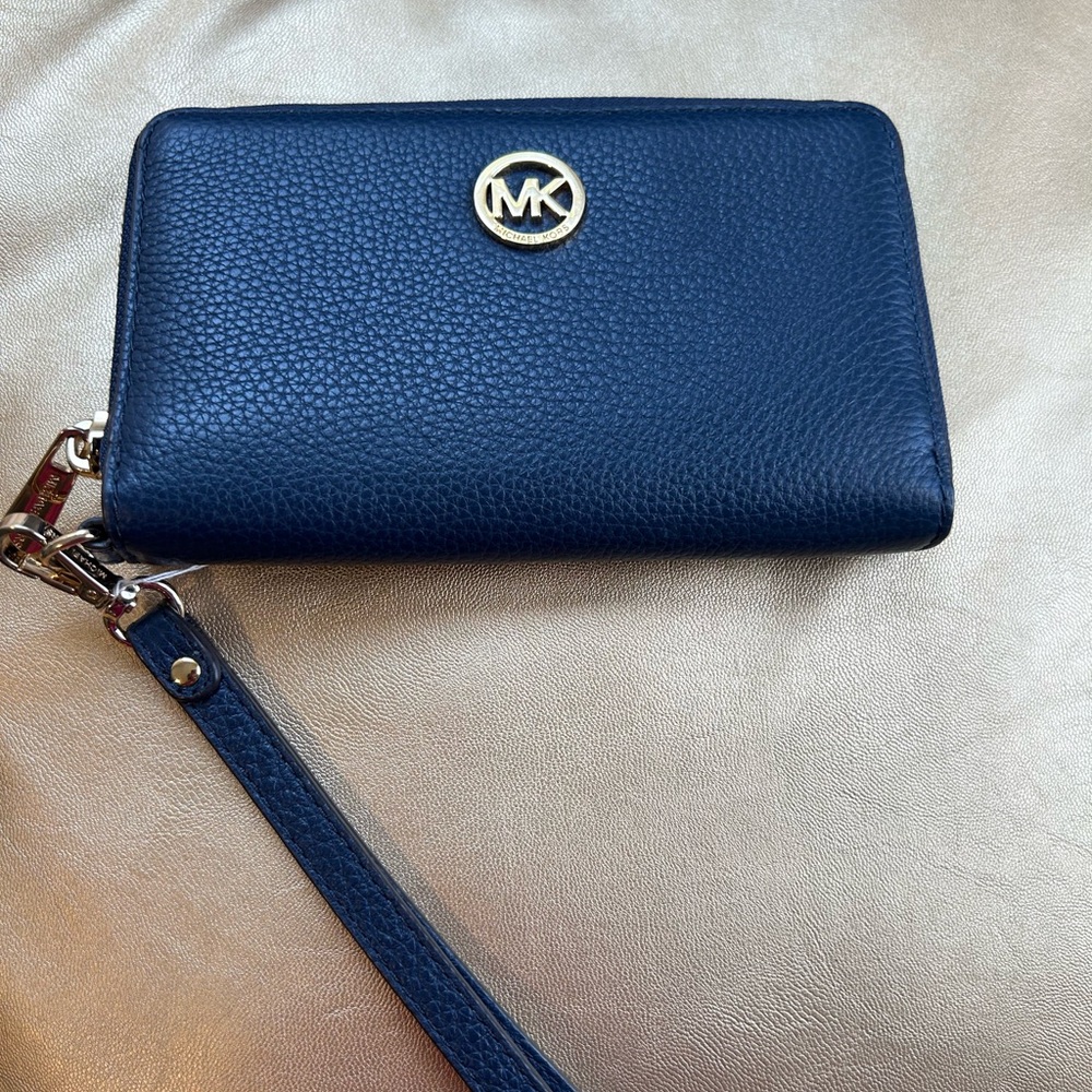 Michael Kors Navy Wristlet with Gold Emblem